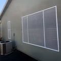 90% dusk grey solar screens installed on home windows blocking heat glare and improving daytime privacy