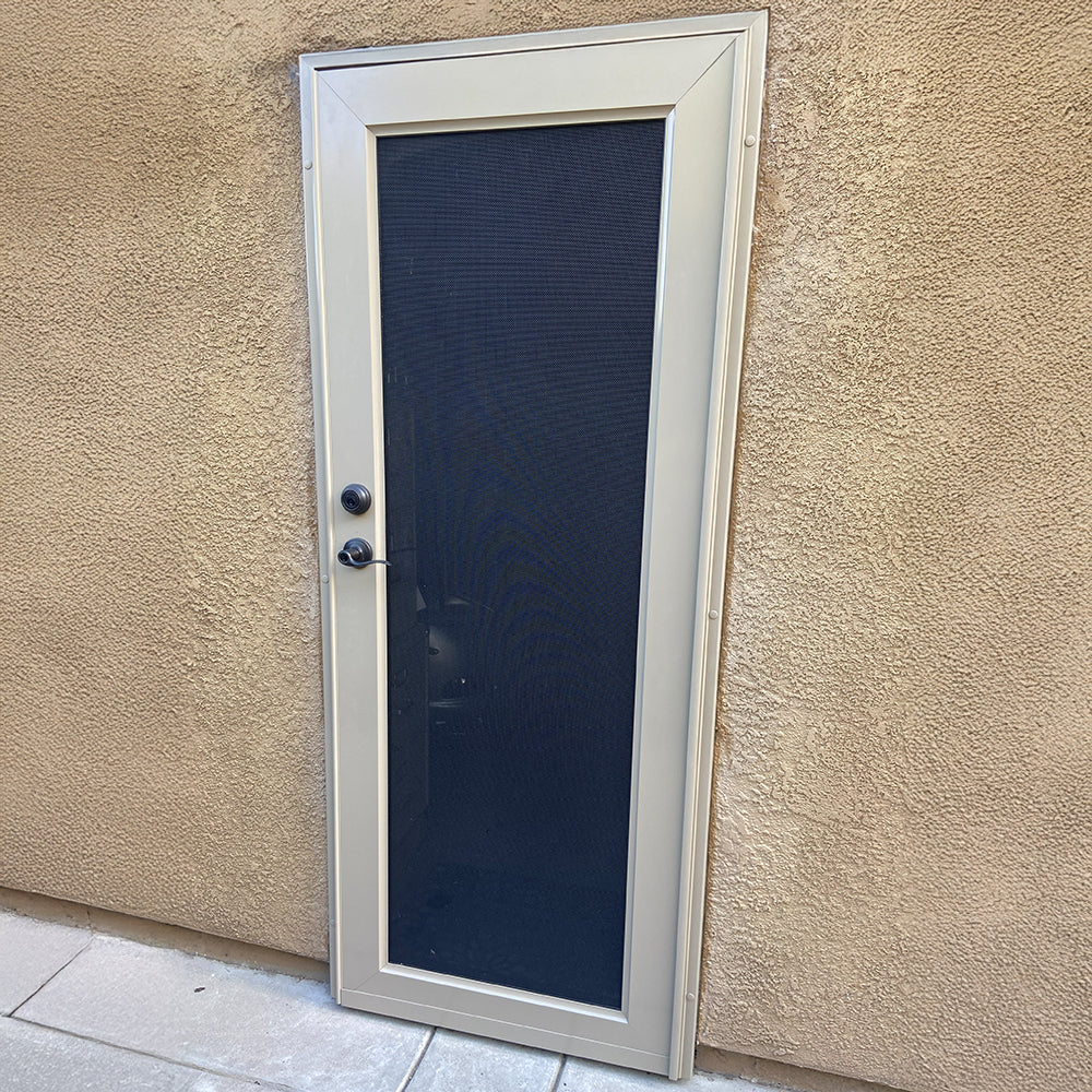 durable metal security screen door installed on exterior door for safety and ventilation