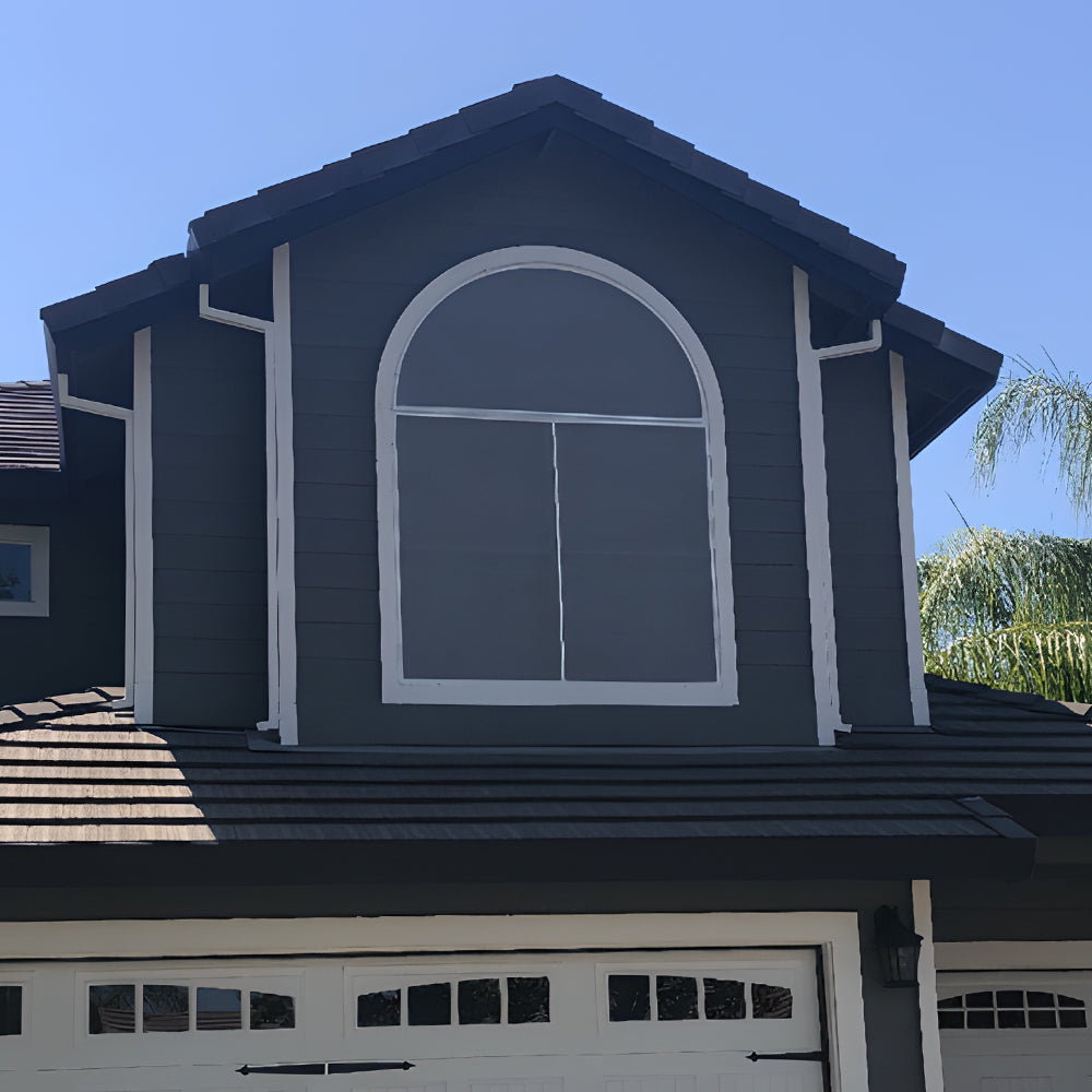 modern home with dusk grey solar screens improving curb appeal and sun protection