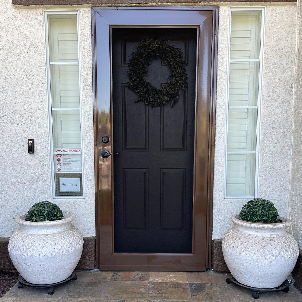modern security screen door with clean design installed on residential home entrance